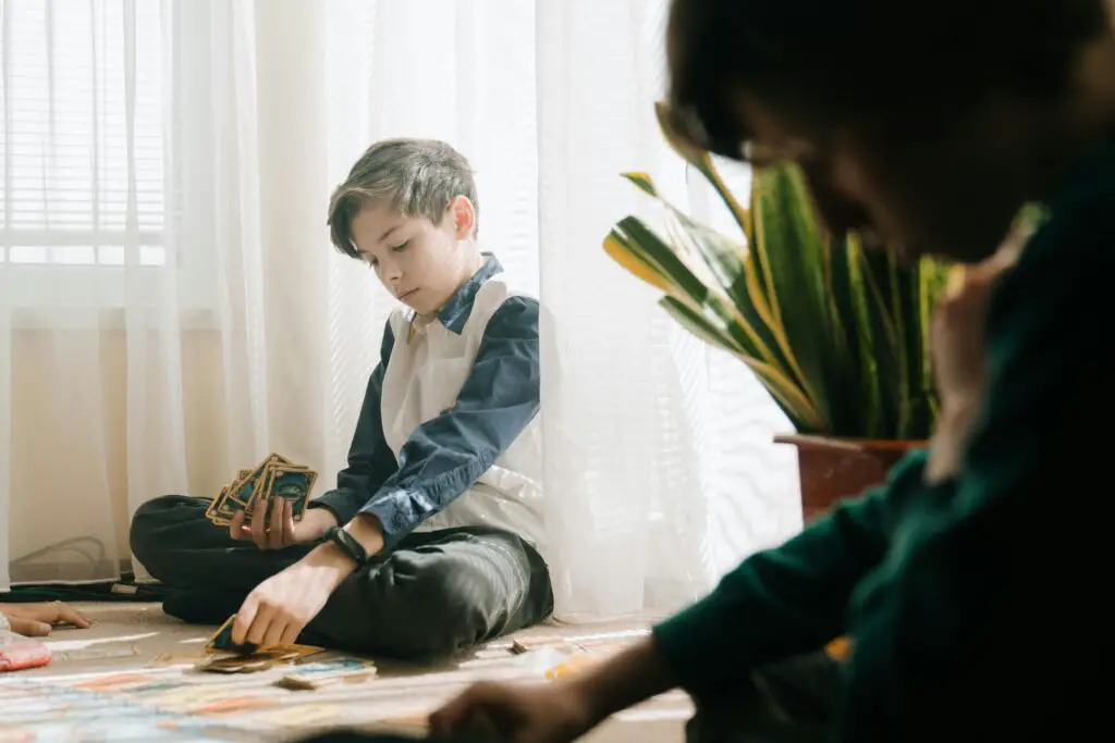 Boy in Gray Suit Jacket Sitting on Floor